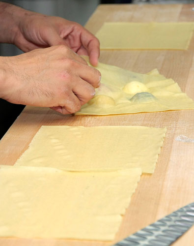 Chef Chanan making pasta by hand closeup